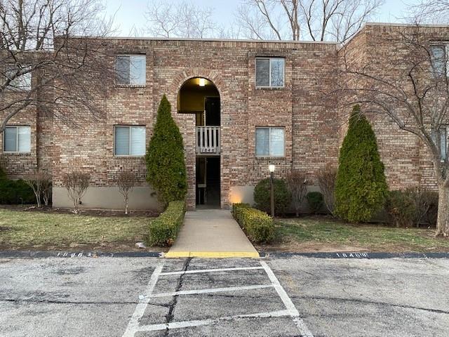 1848 E 97th St Unit C & D, Kansas City, MO 64131 - view of property featuring uncovered parking