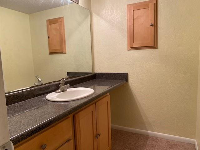 1848 E 97th St Unit C & D, Kansas City, MO 64131 - bathroom featuring vanity and baseboards