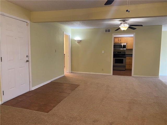 1848 E 97th St Unit C & D, Kansas City, MO 64131 - unfurnished living room featuring ceiling fan and carpet flooring