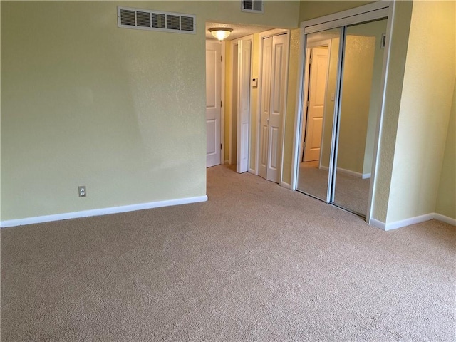 1848 E 97th St Unit C & D, Kansas City, MO 64131 - carpeted spare room with baseboards