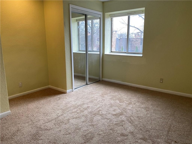 1848 E 97th St Unit C & D, Kansas City, MO 64131 - empty room featuring healthy amount of natural light and carpet flooring