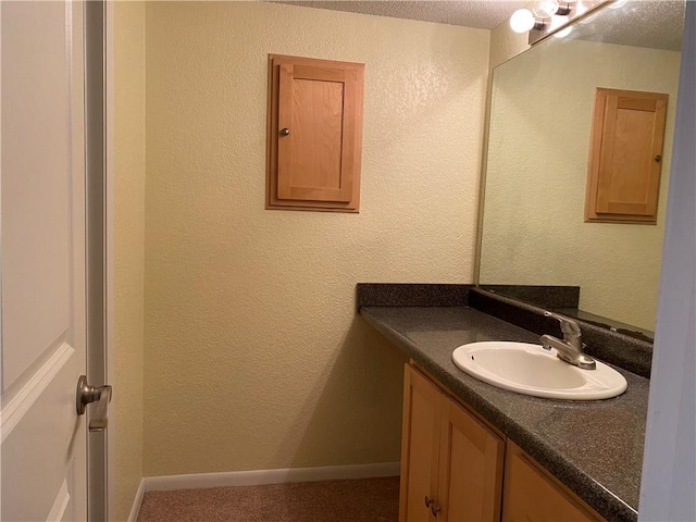 1848 E 97th St Unit C & D, Kansas City, MO 64131 - bathroom with vanity and baseboards