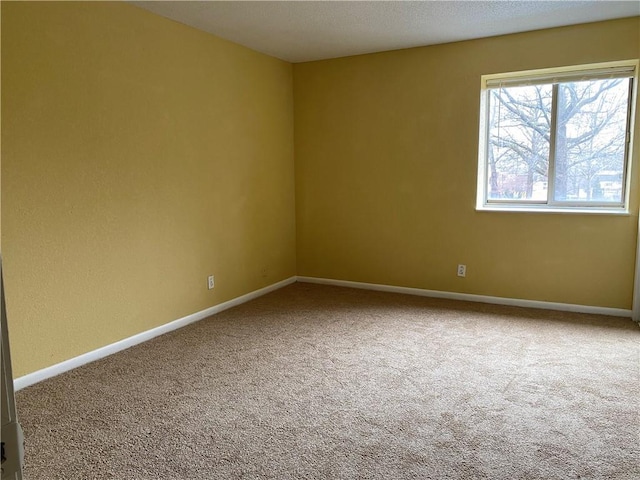 1848 E 97th St Unit C & D, Kansas City, MO 64131 - empty room featuring carpet and baseboards