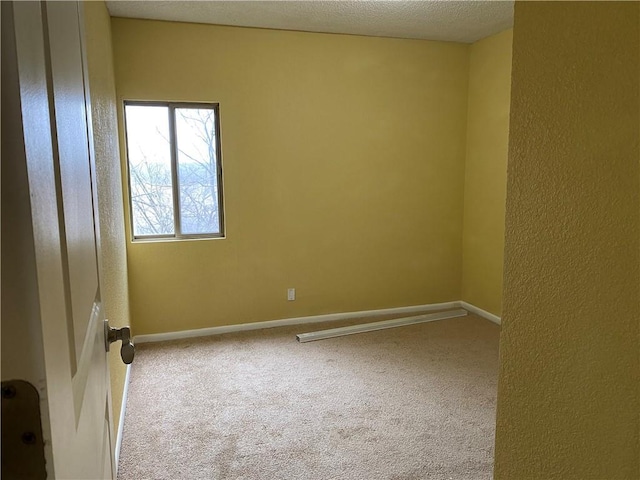 1848 E 97th St Unit C & D, Kansas City, MO 64131 - empty room with carpet, a textured ceiling, and a textured wall
