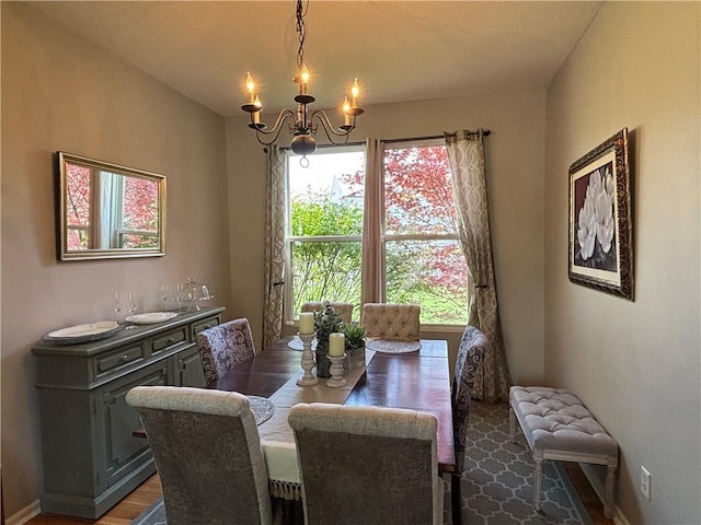 1840 W Fredrickson Cir, Olathe, KS 66061 - dining room featuring a chandelier and wood finished floors