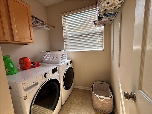 1840 W Fredrickson Cir, Olathe, KS 66061 - laundry room featuring washer and dryer, cabinet space, and light tile patterned floors