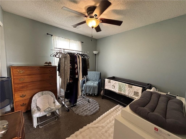 1840 W Fredrickson Cir, Olathe, KS 66061 - carpeted bedroom with a textured ceiling and ceiling fan