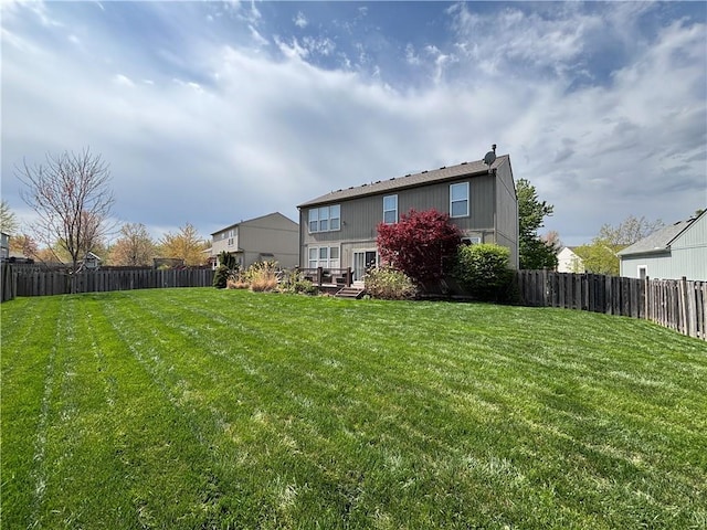 1840 W Fredrickson Cir, Olathe, KS 66061 - back of house with a fenced backyard