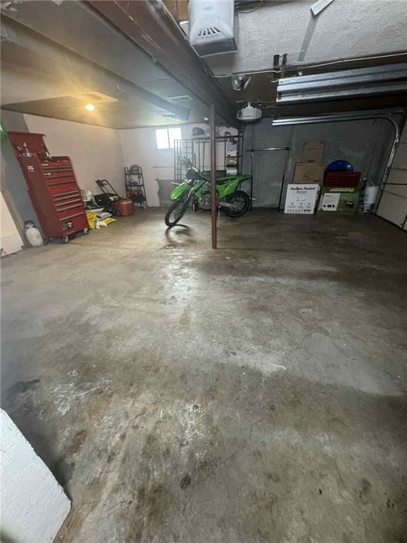 213 SW Palo Dr, Blue Springs, MO 64014 - garage with a garage door opener