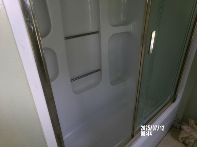 211 W Madison St, Yates Center, KS 66783 - bathroom view of a shower with door