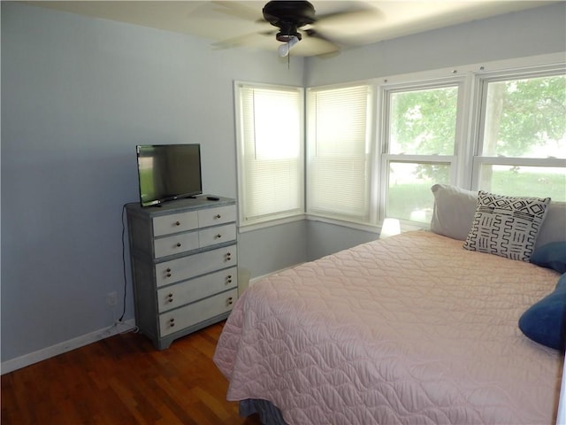 2031 Spruce St, Leavenworth, KS 66048 - bedroom featuring multiple windows and wood finished floors