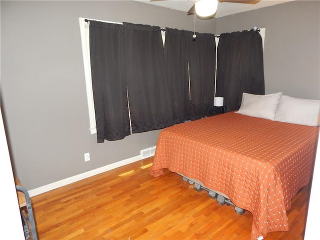 2031 Spruce St, Leavenworth, KS 66048 - bedroom featuring wood finished floors and ceiling fan