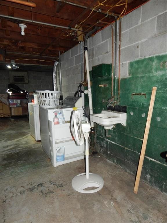 2031 Spruce St, Leavenworth, KS 66048 - unfinished basement featuring separate washer and dryer and concrete block wall