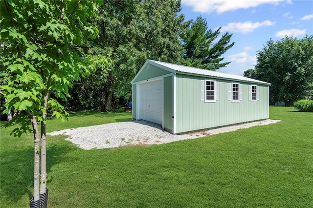 1306 Ruby St, Carrollton, MO 64633 - view of outbuilding featuring driveway