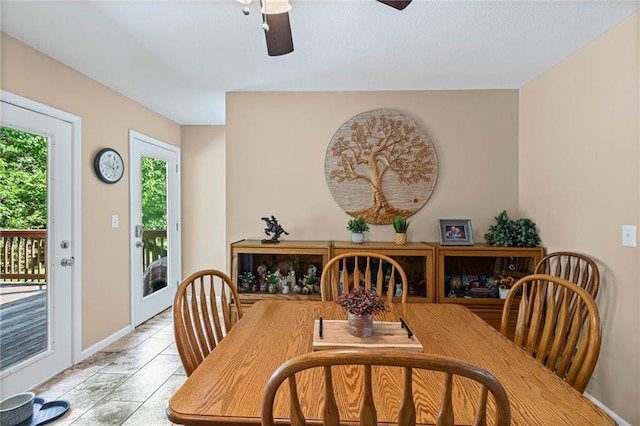 1306 Ruby St, Carrollton, MO 64633 - dining area featuring ceiling fan and baseboards