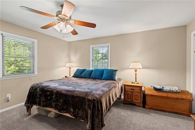 1306 Ruby St, Carrollton, MO 64633 - carpeted bedroom featuring baseboards and ceiling fan