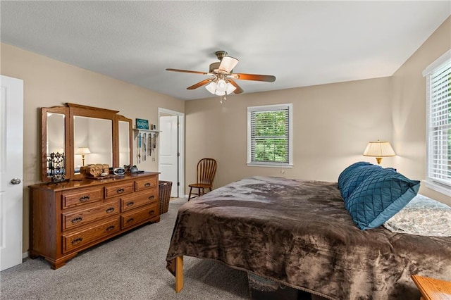 1306 Ruby St, Carrollton, MO 64633 - bedroom featuring light carpet and ceiling fan