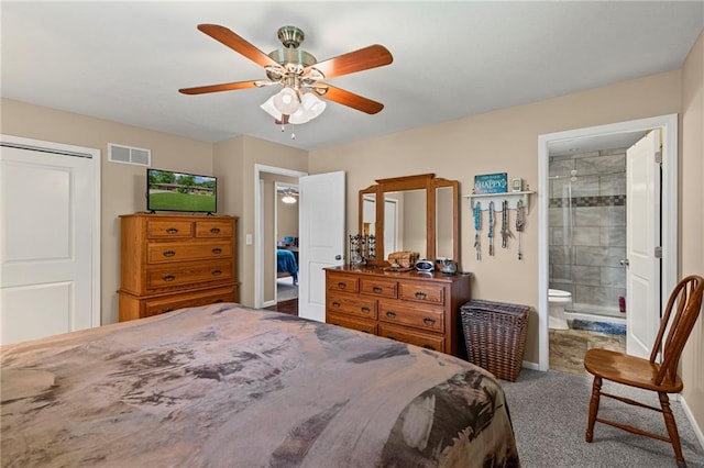 1306 Ruby St, Carrollton, MO 64633 - bedroom featuring carpet floors, connected bathroom, and a ceiling fan