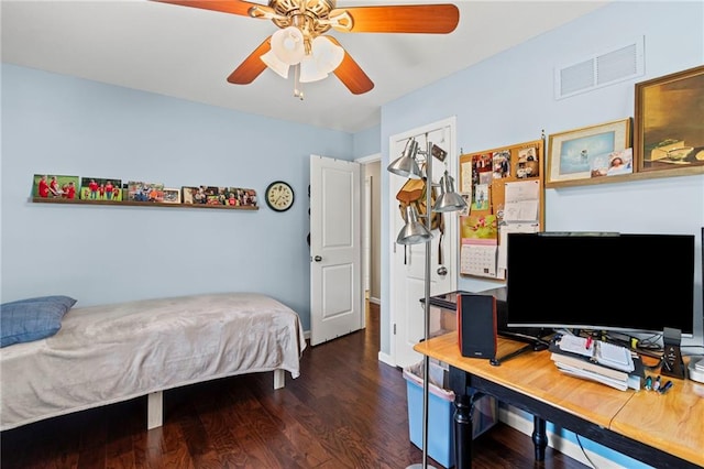 1306 Ruby St, Carrollton, MO 64633 - bedroom with wood finished floors, a desk, and ceiling fan