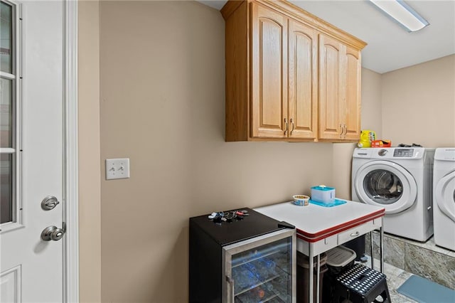 1306 Ruby St, Carrollton, MO 64633 - laundry room featuring washing machine and clothes dryer, cabinet space, and beverage cooler