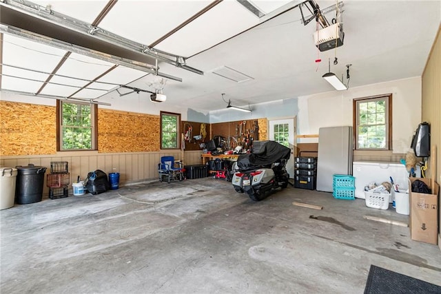 1306 Ruby St, Carrollton, MO 64633 - garage featuring a garage door opener