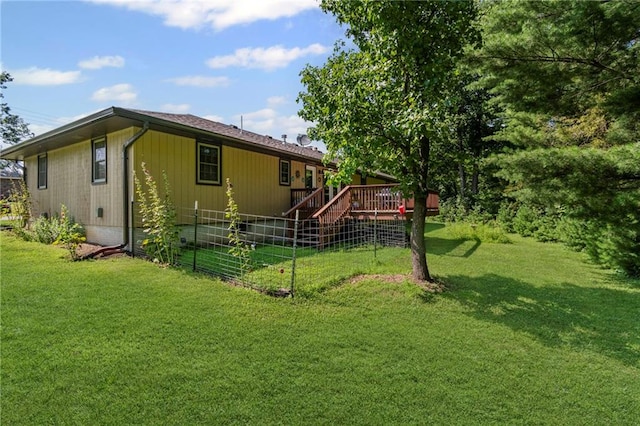 1306 Ruby St, Carrollton, MO 64633 - rear view of house featuring a deck