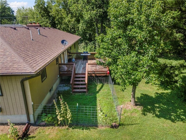 1306 Ruby St, Carrollton, MO 64633 - view of grassy yard with a wooden deck