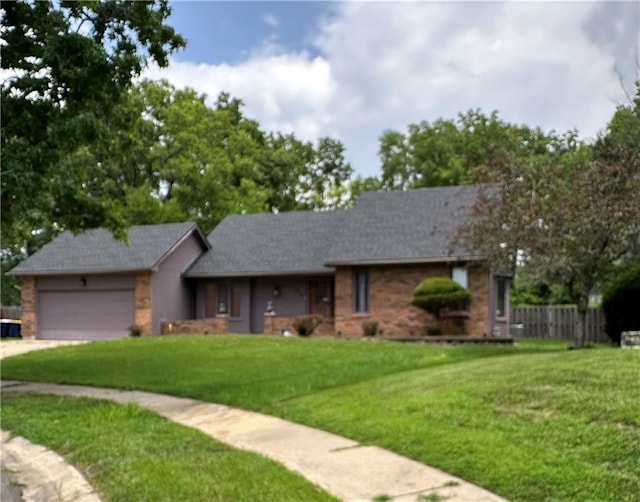 7908 E 96th St, Kansas City, MO 64134 - ranch-style house featuring an attached garage, brick siding, and driveway