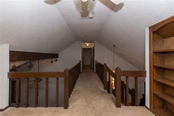 7908 E 96th St, Kansas City, MO 64134 - additional living space with ceiling fan, carpet flooring, and vaulted ceiling