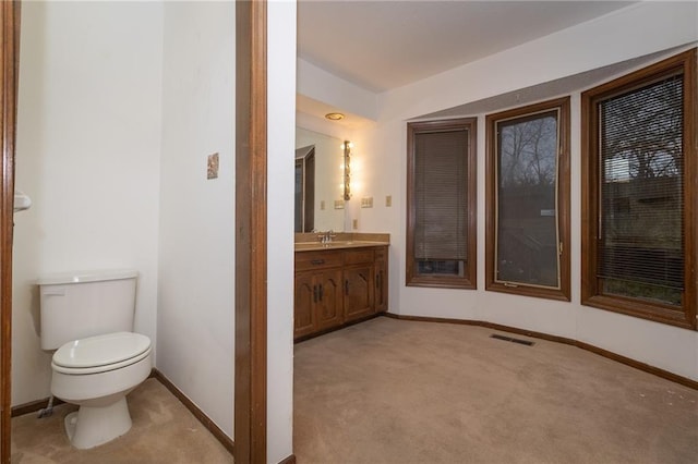 7908 E 96th St, Kansas City, MO 64134 - bathroom featuring toilet and vanity