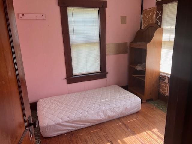 1110 W Main St, Chanute, KS 66720 - bedroom with wood finished floors