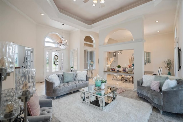 1702 Cedar Ridge Rd, Parsons, KS 67357 - living room with crown molding, a chandelier, recessed lighting, ceiling fan, and a tray ceiling