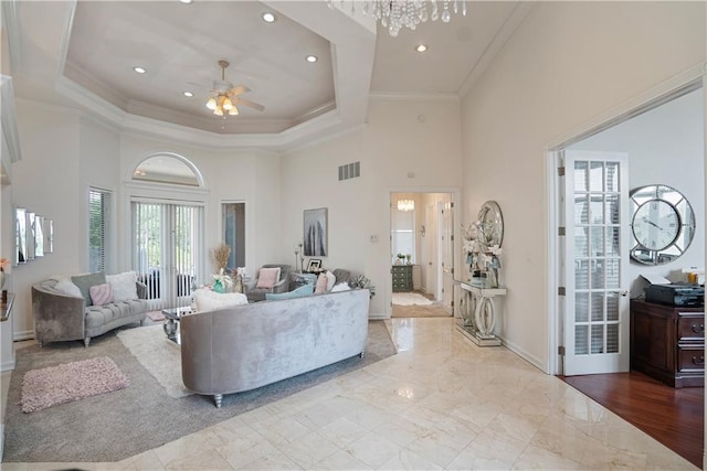 1702 Cedar Ridge Rd, Parsons, KS 67357 - living area featuring a high ceiling, crown molding, a ceiling fan, recessed lighting, and marble finish flooring