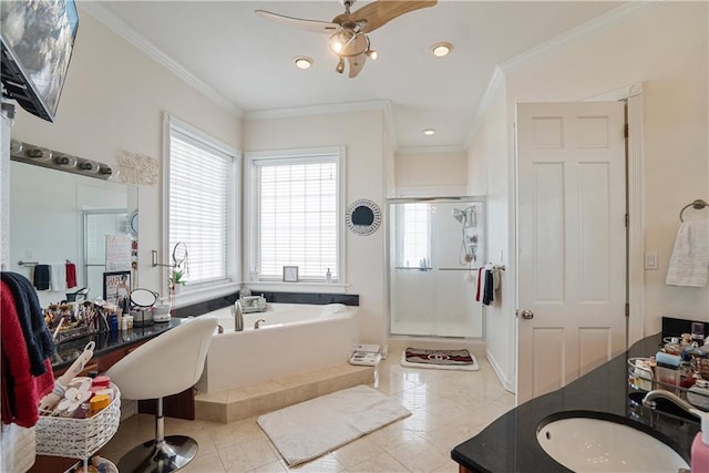 1702 Cedar Ridge Rd, Parsons, KS 67357 - bathroom with healthy amount of natural light, a garden tub, ceiling fan, crown molding, and recessed lighting