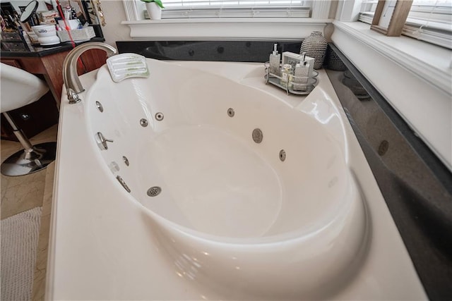 1702 Cedar Ridge Rd, Parsons, KS 67357 - bathroom featuring a whirlpool tub