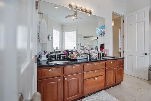 1702 Cedar Ridge Rd, Parsons, KS 67357 - bathroom with ornamental molding, marble finish flooring, and a ceiling fan