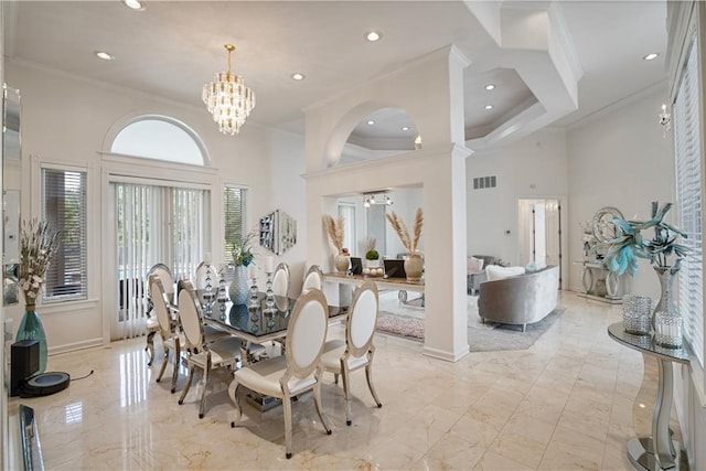 1702 Cedar Ridge Rd, Parsons, KS 67357 - dining area featuring a high ceiling, crown molding, light marble finish flooring, a chandelier, and recessed lighting