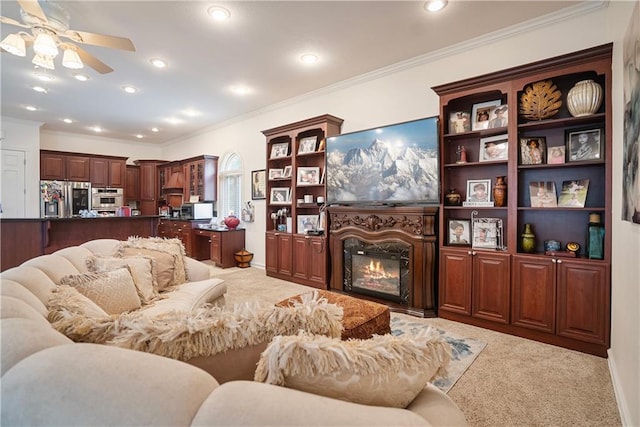 1702 Cedar Ridge Rd, Parsons, KS 67357 - living room featuring carpet, ceiling fan, crown molding, a glass covered fireplace, and recessed lighting