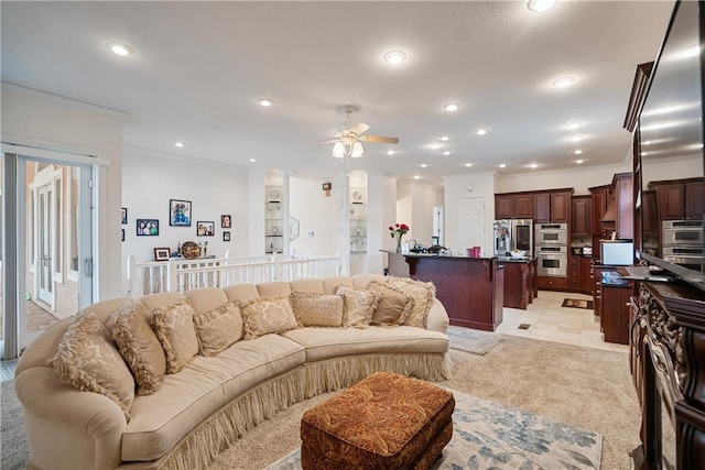 1702 Cedar Ridge Rd, Parsons, KS 67357 - living room with ceiling fan, recessed lighting, ornamental molding, light colored carpet, and built in shelves