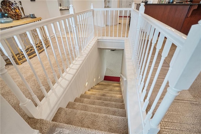 1702 Cedar Ridge Rd, Parsons, KS 67357 - stairway featuring carpet