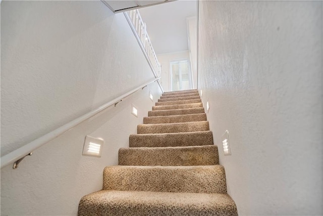 1702 Cedar Ridge Rd, Parsons, KS 67357 - staircase featuring a textured wall