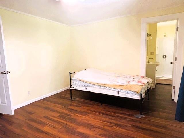 621 N 3rd St, Burlington, KS 66839 - bedroom with wood finished floors, ornamental molding, and ensuite bath