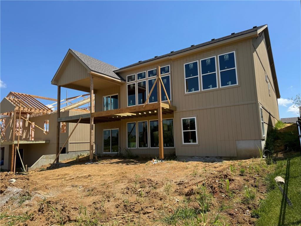 2156 Black Walnut Dr, Liberty, MO 66085 - rear view of property with a wooden deck