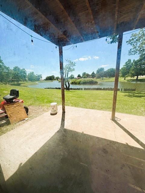 143 N 3rd St, New Strawn, KS 66839 - view of patio with a water view