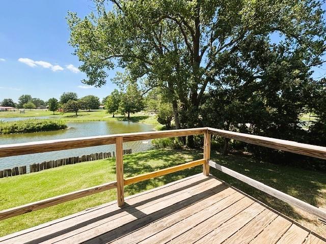 143 N 3rd St, New Strawn, KS 66839 - wooden deck featuring a water view and a yard