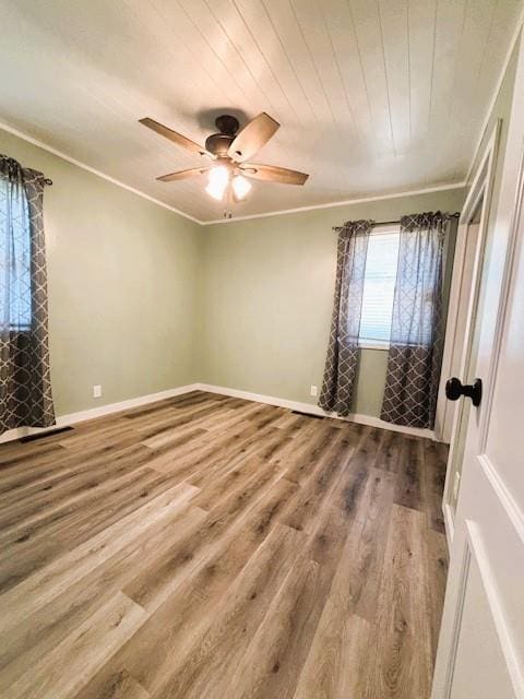 143 N 3rd St, New Strawn, KS 66839 - unfurnished room with wood finished floors, ceiling fan, and ornamental molding