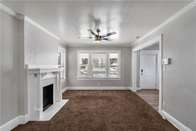 4001 Tracy Ave, Kansas City, MO 64110 - unfurnished living room featuring carpet, ceiling fan, crown molding, a fireplace with flush hearth, and wooden ceiling