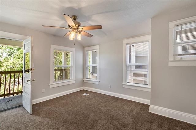4001 Tracy Ave, Kansas City, MO 64110 - unfurnished room with dark carpet and ceiling fan