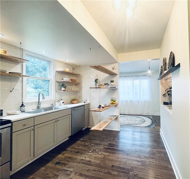 1643 Jefferson St, Kansas City, MO 64108 - kitchen with open shelves, stainless steel appliances, gray cabinets, and tasteful backsplash