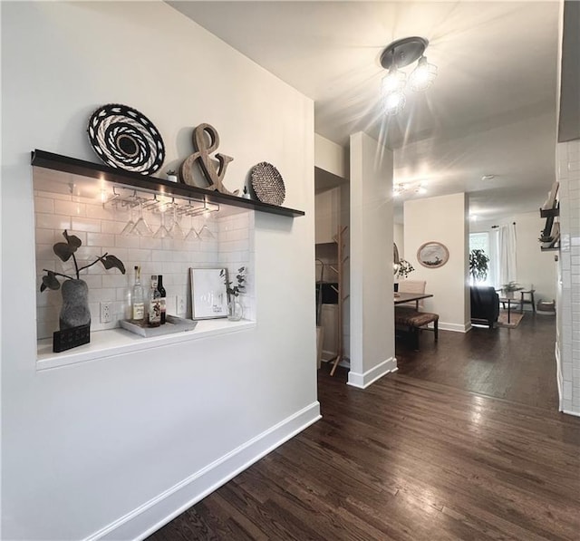 1643 Jefferson St, Kansas City, MO 64108 - hallway featuring wood finished floors and baseboards